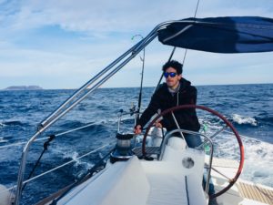 Llorenç on the helm Sailing
